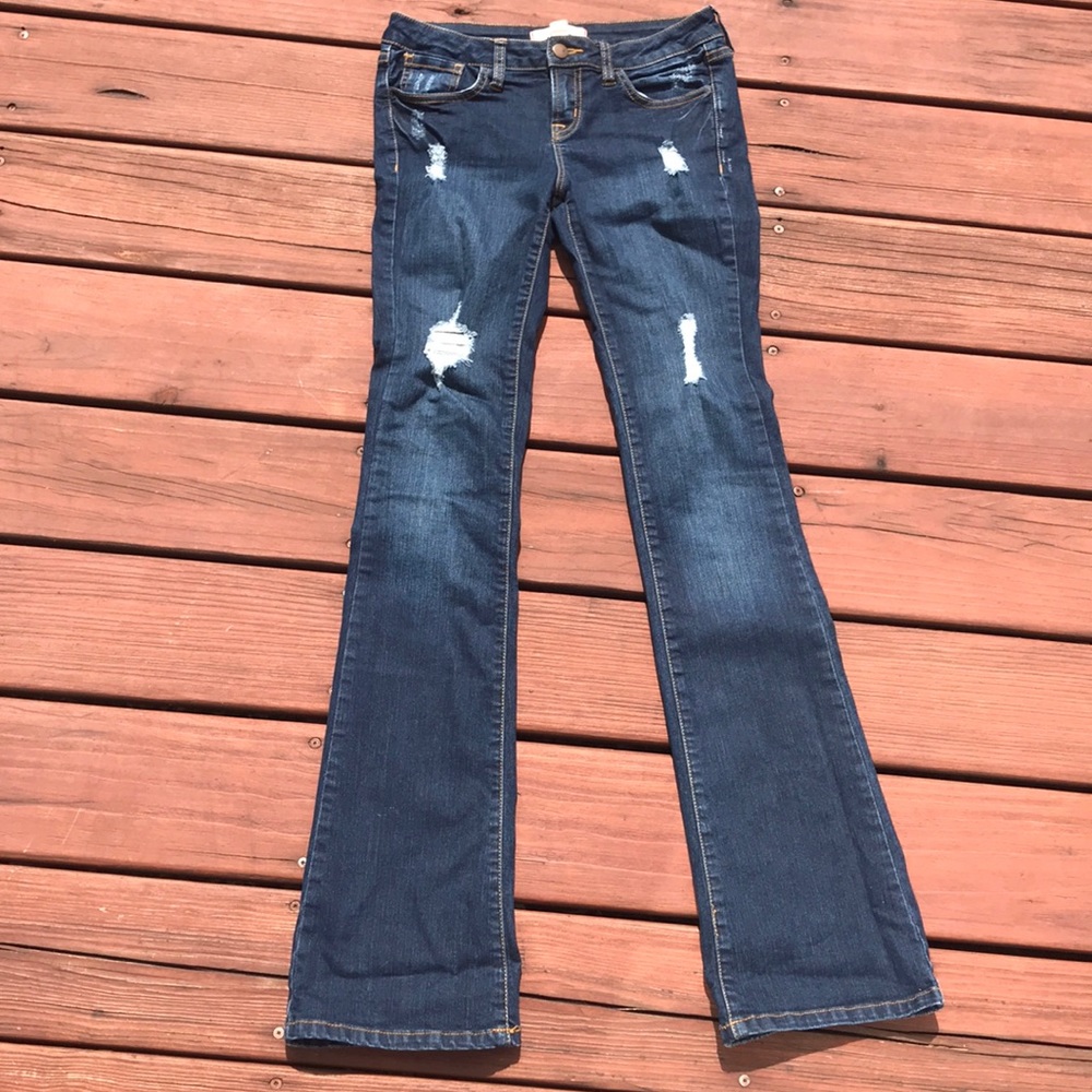 Distressed blue jeans